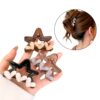 BROCHE DE ESTRELLA CON CORAZONES 7CM
